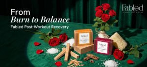 Fabled post workout recovery soaps with rose petals, sandalwood sticks and bath salts on green background